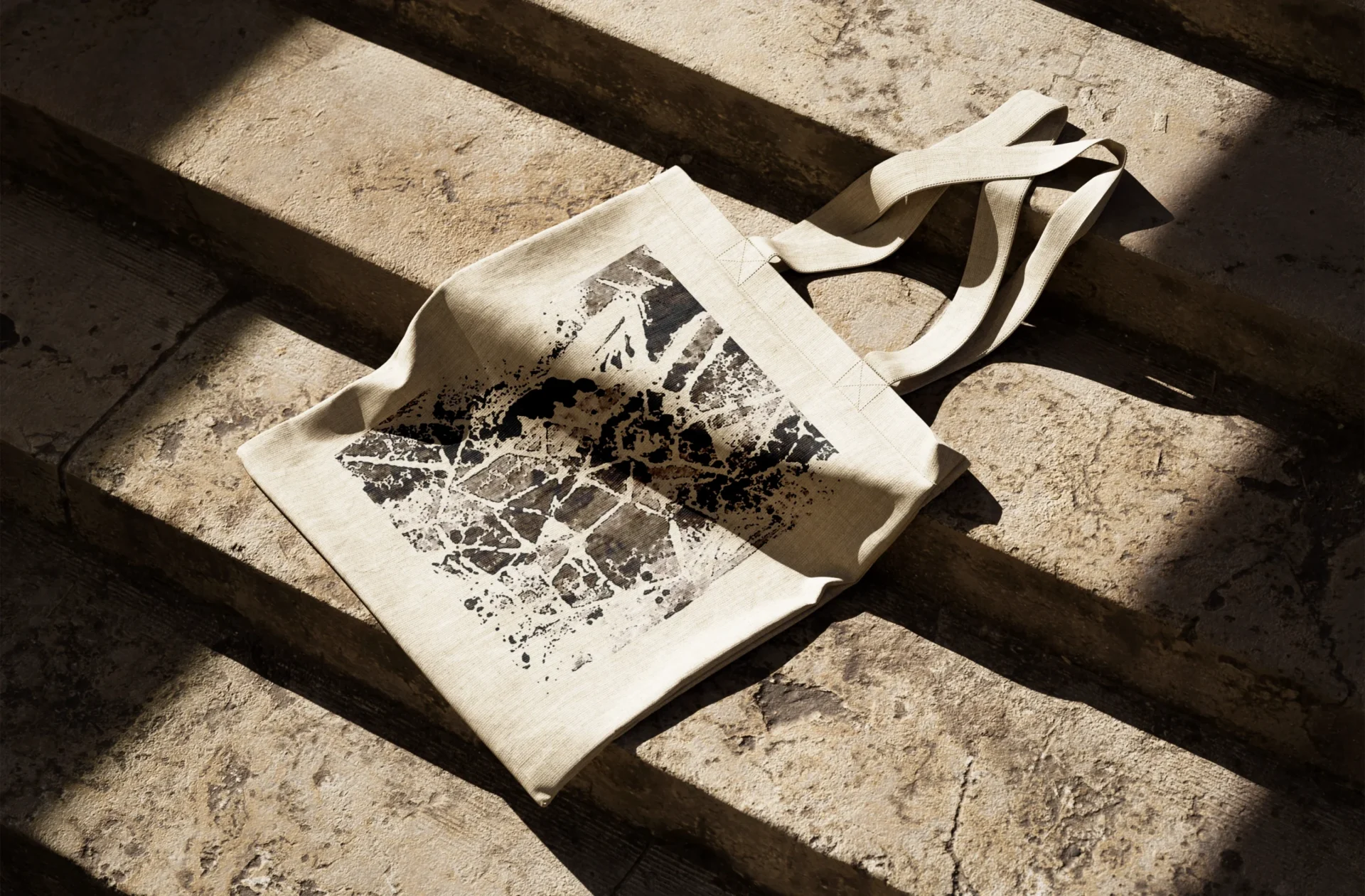 A tote bag with a linocut print based on the graphics from the 'Miaou Expo' poster illustration.